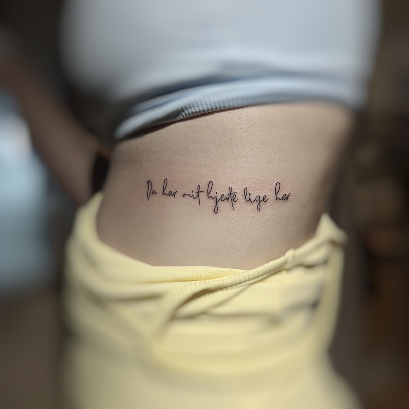 Tattoo-RippenSchriftzug