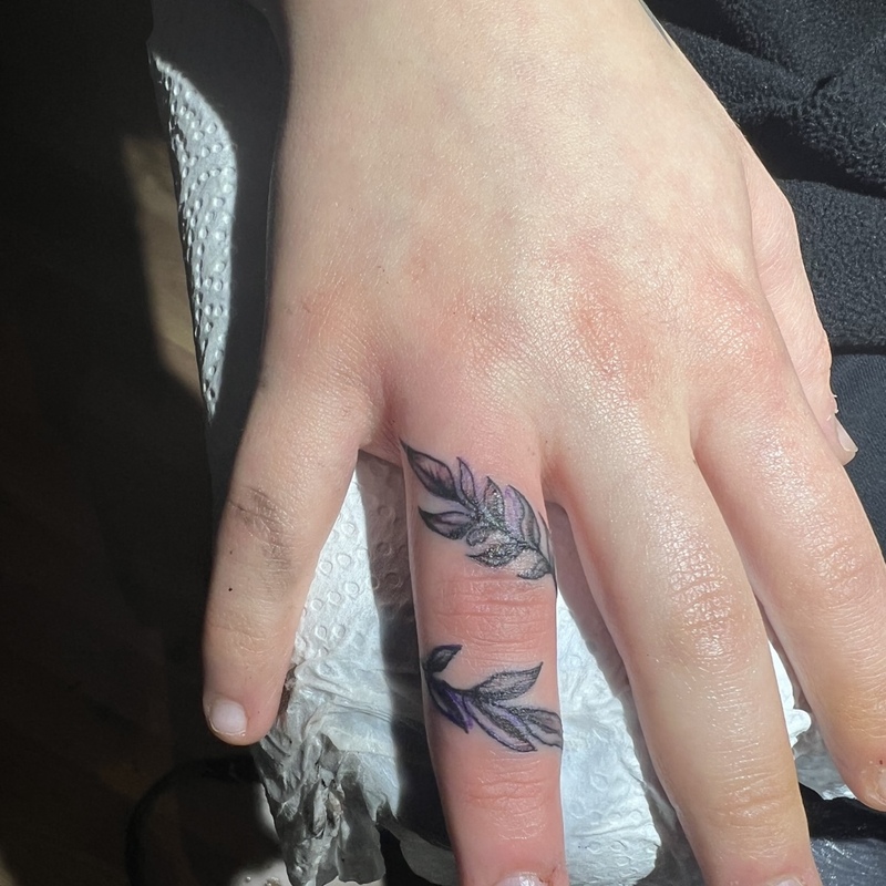 Tattoo-UmdenFingergewickelt